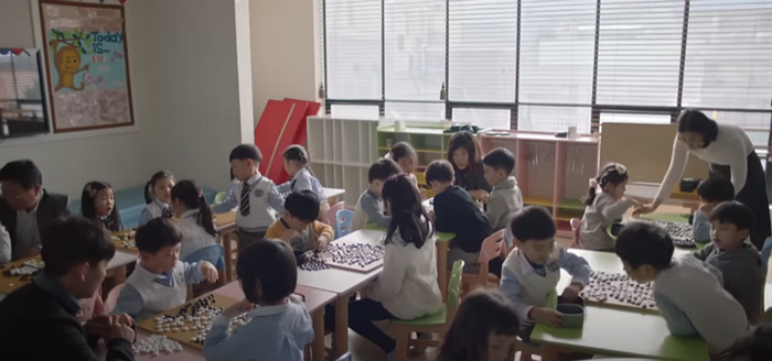 Elementary kids playing Go Game